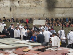 Bar Mitzvah at the Western Wall...notice the women family members on the other side of the wall looking in, as is the custom.